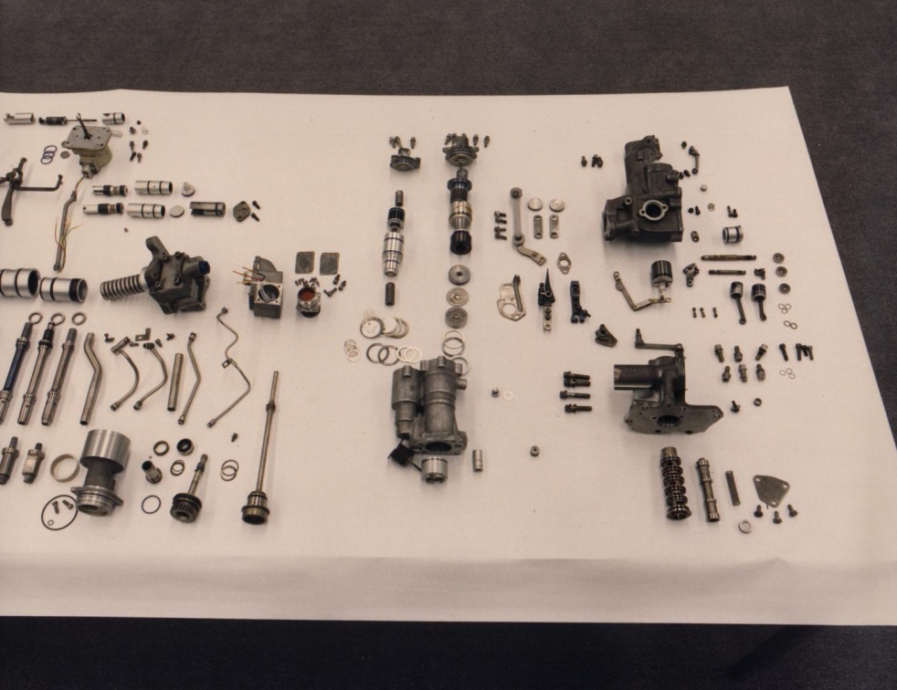 Another view of some of the thousands of parts that go into a Woodward jet engine fuel control.