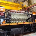 An EMD diesel engine showing the Woodward PG Rail governor(dark green unit on the left of the engine).