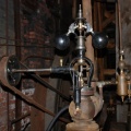 An original steam engine still operating in a mill.