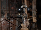 An original steam engine still operating in a mill.