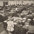 The main office area before the cubical wall partition was invented..