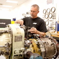 Working on a Honeywell TPE 331 series gas turbine engine.