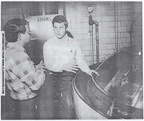 John showing a tourist the brewing process.