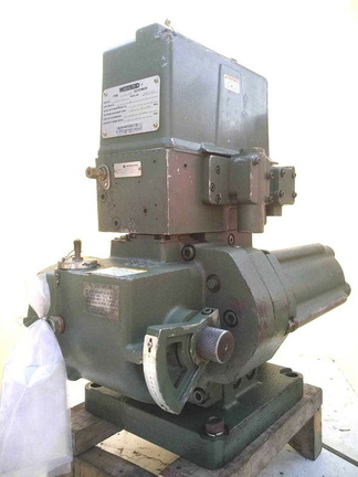 A large Woodward PGA -300 series hydraulic diesel engine governor.