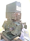 A large Woodward PGA series hydraulic diesel engine governor.