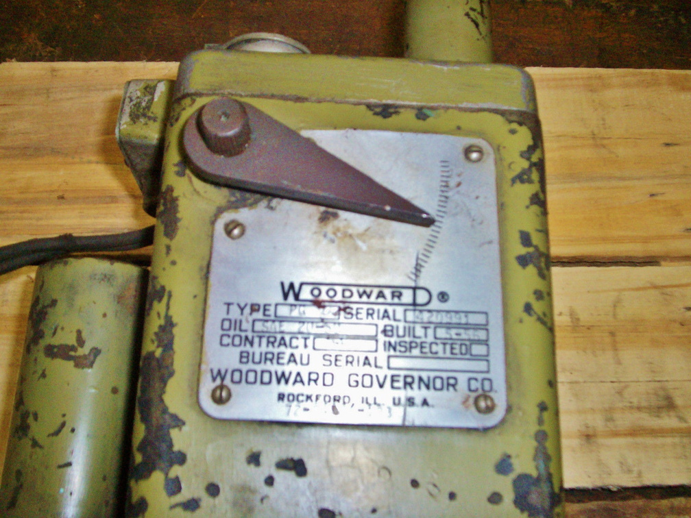 A well used Woodward PG type governor.