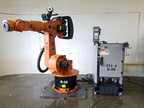 A well used robotic arm system for sale