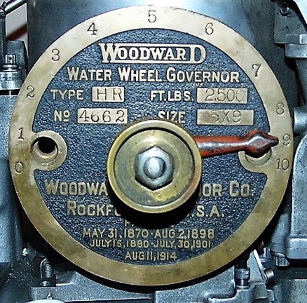 A Woodward gate shaft opening positioning dial in the collection.