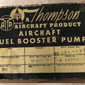 A THOMPSON JET ENGINE FUEL PUMP NAME PLATE.