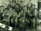 Stevens Point Brewery workers in front of the original brew house building in the 1890's.