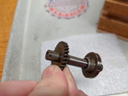 Closeup of the cam and gear conponent.