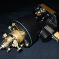 A legacy Woodward CSSA propeller governor for aircraft engines.