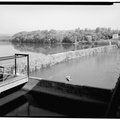 VIEW OF DAM NO. 5 FROM POWER HOUSE. Taken by Jet Lowe, HAER staff photographer, September 1980 - Dam No. 5 Hydroelectric Plant, On Potomac River, Hedgesville, Berkeley County, HAER WVA,2-HEDVI.V,1-47.tif