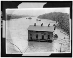 Photocopy of photograph, October 16, 1942. VIEW, LOOKING DOWNSTREAM, OF POWER HOUSE DURING FLOOD. (Courtesy of the Potomac Edison Company Library (Hagerstown, MD), Historical HAER WVA,2-HEDVI.V,1-51.tif