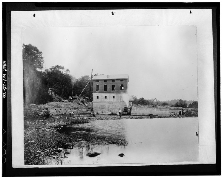 EAST_VIEW_SHOWING_WALLS_AND_ROOF_INSTALLED,_TAILRACE_EXCAVATION_NEARING_COMPLETION,_c._1918._-_Dam_No._5_Hydroelectric_Plant,_On_Potomac_River,_Hedgesville,_Berkeley_County,_WV_HAER_WVA,2-HEDVI.V,1-26.tif.jpg