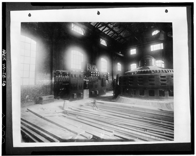 INTERIOR VIEW SHOWING GENERATOR UNIT 2 IN PLACE AND SWITCH BOARD BEING WIRED, c. 1918. - Dam No. 5 Hydroelectric Plant, On Potomac River, Hedgesville, Berkeley County, WV HAER WVA,2-HEDVI.V,1-28.tif