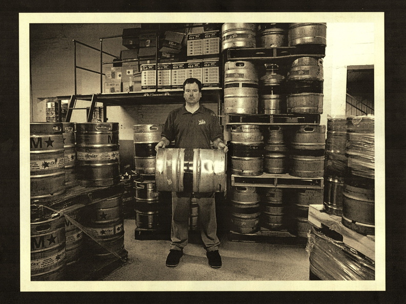 Brewer Brad Rolling Out the Barrels, circa 2012..jpg