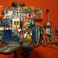 An engine model cutaway showing the fuel injection pump and governor system.