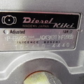 A Diesel Kiki engine governor name plate.