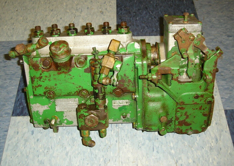 A well used American Bosch Fuel Injection Pump and Woodward Governor System.