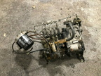 A well used American Bosch Fuel Injection Pump and Governor System.