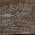 A Fuller & Johnson brass engine name plate.