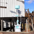 The Volcan Street Hydo Plant showing the original James Leffel turbine water wheel.