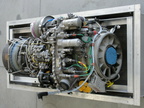 A General Electric T700 series jet engine with a Woodward fuel control system application.
