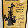 A vintage Woodward Water Wheel governor advertisement printed on aluminum.