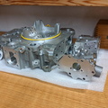 A machined fuel valve housing cutaway component of the Woodward CF6-80 jet engine fuel control system.