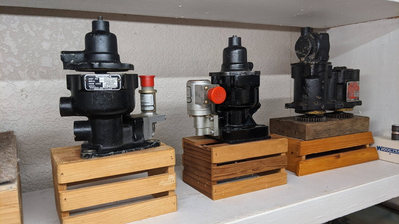 Three little aircraft engine governors in the collection.