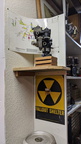An AiResearch gas turbine fuel control next to the fallout shelter.
