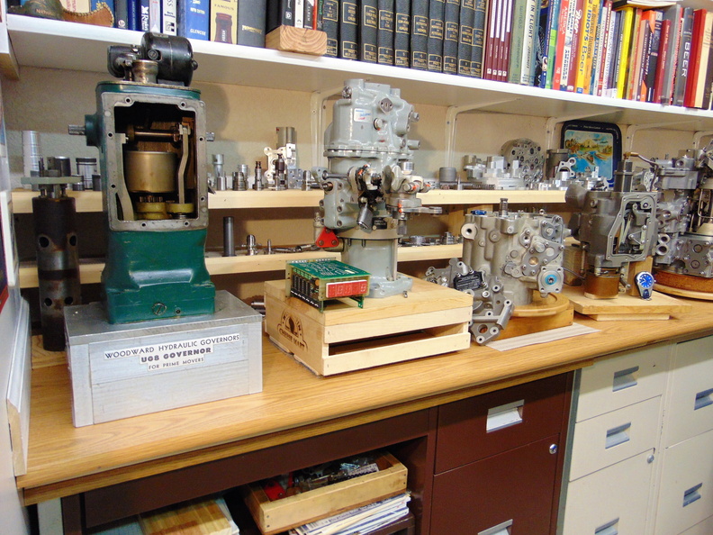 The first three controls starting on the left are a 1950's Woodward UG8 series diesel engine governor with the cover removed, in the middle a 1960's Lucas CASC series jet engine fuel control taken apart and on the right a 1970's General Electric T700 series gas turbine fuel control contraption. 70.JPG