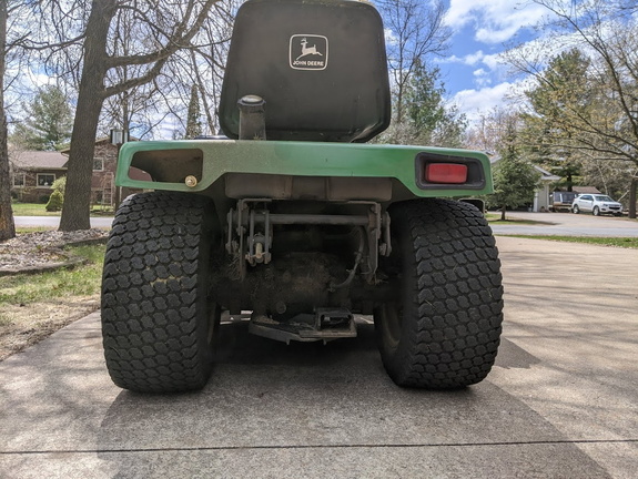 After decades of operating this John Deere tractor, only lost one tail light.