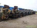 Vintage diesel engines lined up.