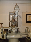 A Woodward VR(vertical relay) type hydraulic water wheel governor on display at the Midway Village Museum in Rockfor, Ill.