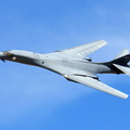A Rockwell B-1 Lancer performs a fly-by during a firepower demonstration.