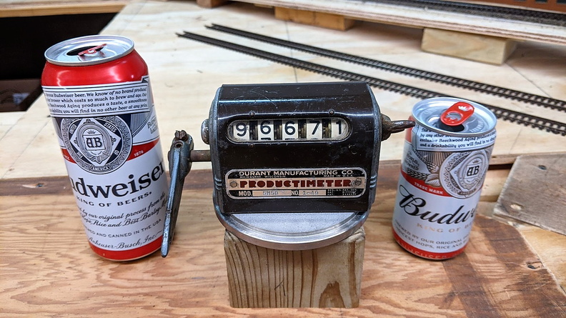 An obsolete mechanical beer can production counter replaced by a digital counter.