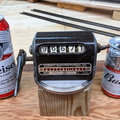 An obsolete mechanical beer can production counter replaced by a digital counter.