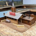 A lumber mill added to the model railroad.