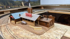 A lumber mill added to the model railroad.