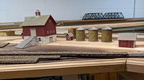 A barn and outbuildings added to the model raiload.