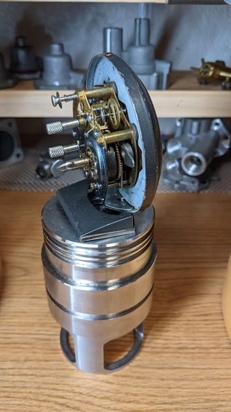 A mechanical clock on a piston