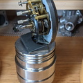 A mechanical clock on a piston