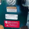 The Woodward TG13 series governor name plate on the steam turbine.