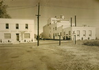 Looking at the Stevens Point Brewery's new white paint job in the 1950's.