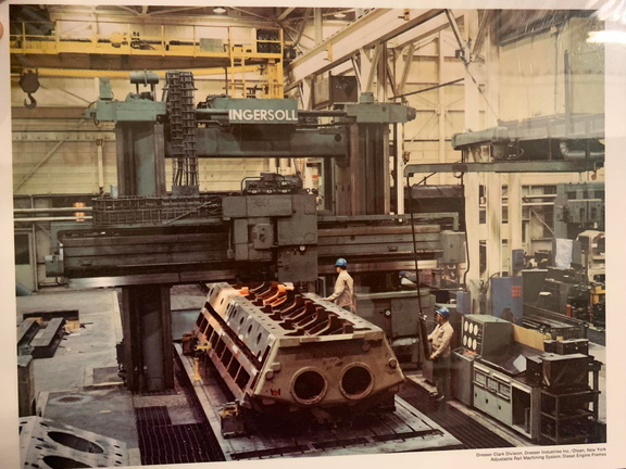 A massive ship engine block getting ready to get machined by an Ingersoll machine.