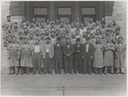 Woodward Governor Company worker members pose for a picture on the front steps at the visitors door enterance in Rockford, Illinois.