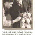 Elmer and George looking over several Hamilton Standard aircraft engine governor.