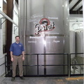 Brewer Brad next to a new 300 barrel(10,800 gallon) brewery beer tank.